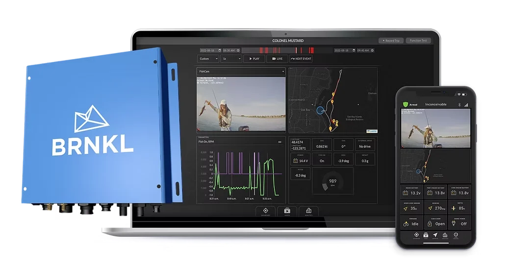 The blue BRNKL Blue unit beside the desktop dashboard and phone app, showing live camera footage, vessel track, engine graphs and battery status